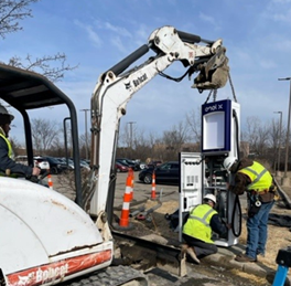 Image of the crew at State Electric Company installing a Level 3 EV charging station at the Cadillac of Novi.